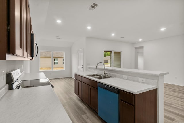 kitchen featuring dishwasher, a sink, electric range oven, light wood-style flooring, and light countertops