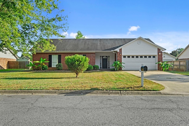 ranch-style home featuring fence, concrete driveway, a front yard, an attached garage, and brick siding