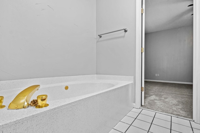 full bathroom with tile patterned floors and a garden tub