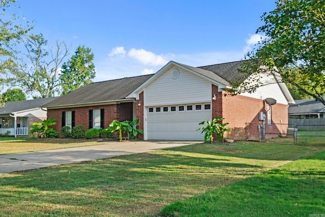 ranch-style house featuring brick siding, driveway, a front lawn, and fence