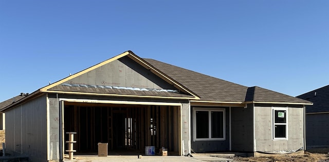 14 Sig Cv, Ward, AR 72176 - rear view of house with an attached garage and driveway