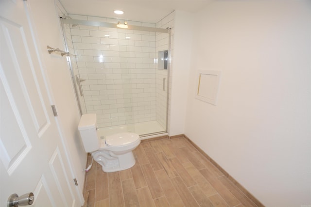 116 Nickels St, Hot Springs, AR 71913 - bathroom with toilet, a shower stall, and wood tiled floor