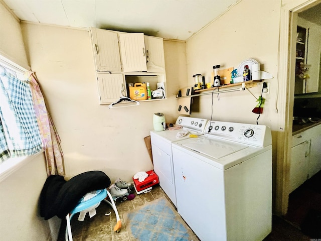 laundry room with cabinet space and independent washer and dryer