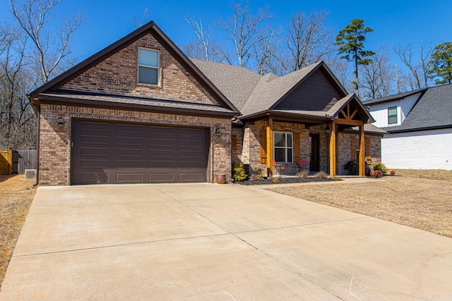 view of front of home with brick siding, an attached garage, concrete driveway, and a shingled roof