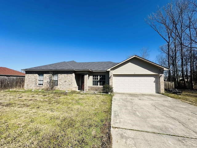 single story home featuring a front lawn, fence, concrete driveway, a garage, and brick siding