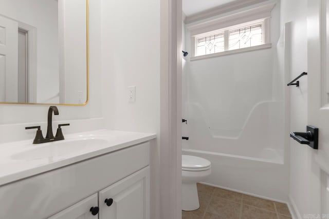 bathroom featuring shower / tub combination, tile patterned floors, toilet, and vanity