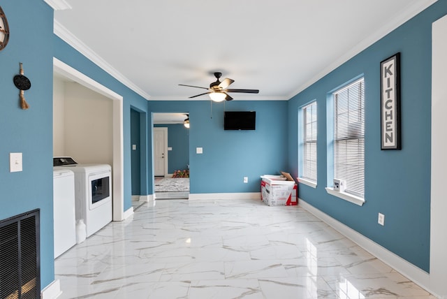 laundry area featuring laundry area, marble finish floor, baseboards, and ornamental molding