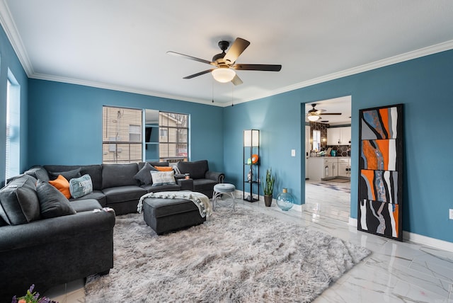 living area with crown molding, baseboards, marble finish floor, and ceiling fan