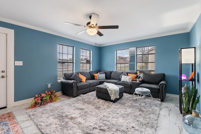 living area with marble finish floor, a ceiling fan, baseboards, and ornamental molding