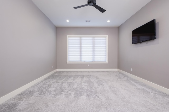 spare room with visible vents, recessed lighting, a ceiling fan, and baseboards