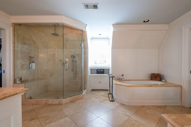 full bathroom featuring a garden tub, crown molding, visible vents, and a stall shower