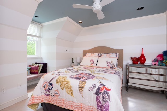 bedroom featuring ceiling fan and ornamental molding