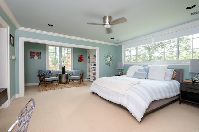 bedroom with light carpet, visible vents, baseboards, and ornamental molding