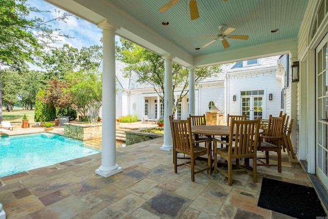 view of patio featuring outdoor dining area, french doors, an outdoor pool, and ceiling fan