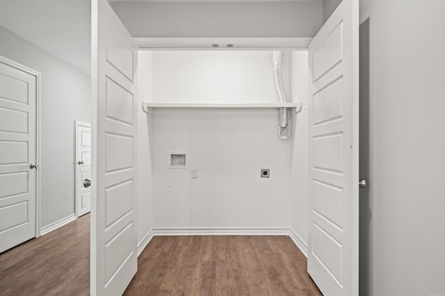 laundry area featuring laundry area, hookup for a washing machine, electric dryer hookup, and wood finished floors