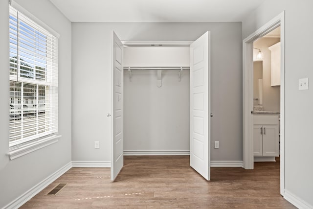 closet featuring visible vents