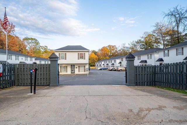 view of street with a residential view and driveway