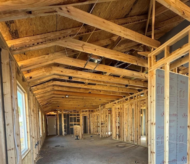 misc room with lofted ceiling