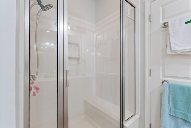 bathroom with a stall shower