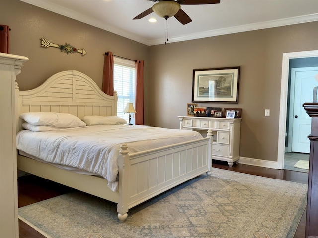 bedroom featuring recessed lighting, baseboards, dark wood-style flooring, and crown molding