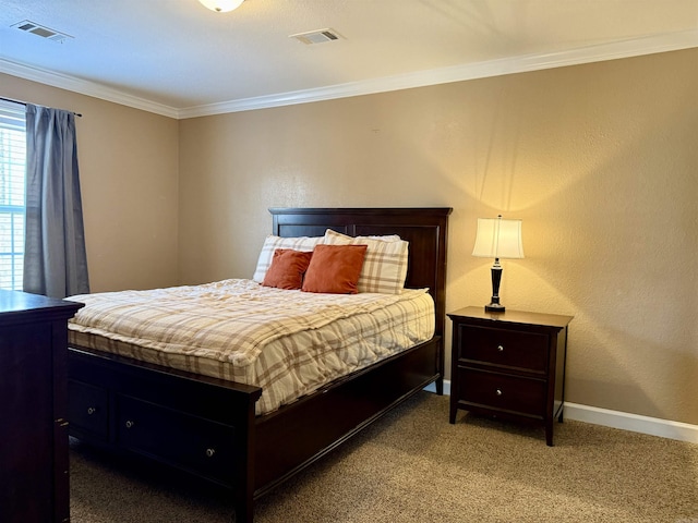 bedroom with visible vents, baseboards, light carpet, and crown molding