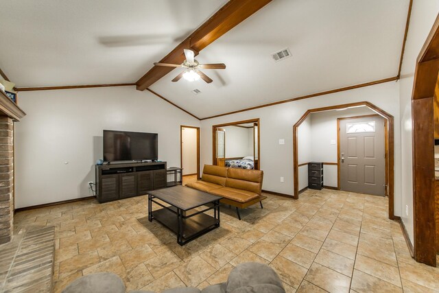 living room with visible vents, ceiling fan, baseboards, lofted ceiling with beams, and ornamental molding