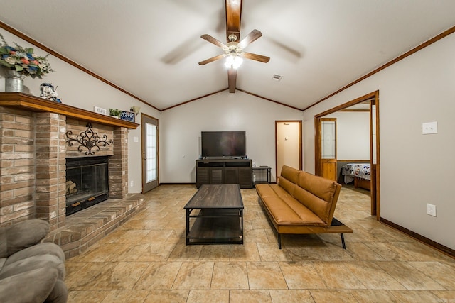 living room featuring baseboards, vaulted ceiling with beams, a fireplace, and crown molding