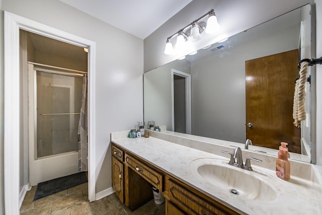 full bathroom with visible vents, shower / bathtub combination, baseboards, and vanity