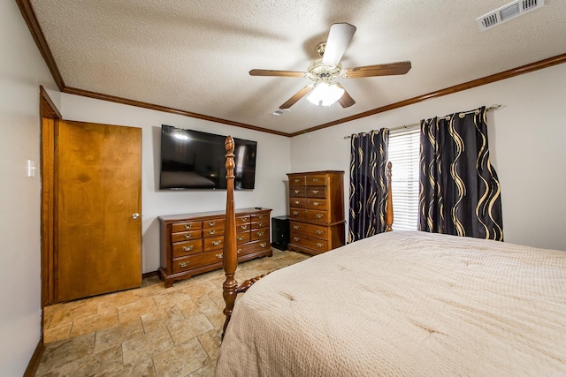 bedroom featuring visible vents, a textured ceiling, and crown molding