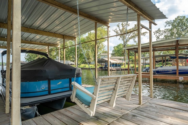 view of dock with a water view and boat lift