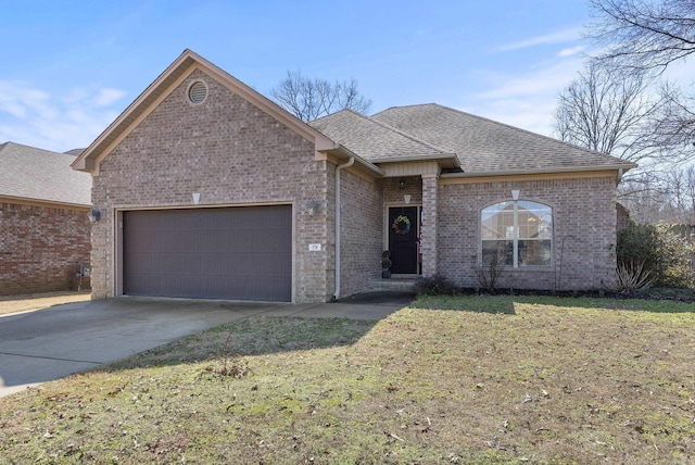 ranch-style home with a garage, brick siding, roof with shingles, and driveway