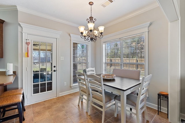 dining room featuring a chandelier, plenty of natural light, visible vents, and ornamental molding