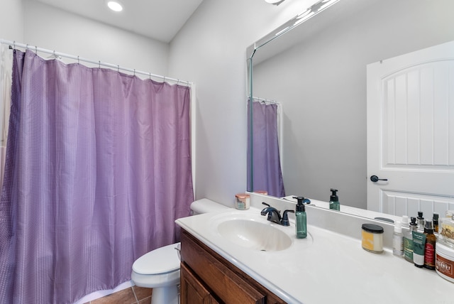 bathroom featuring vanity, curtained shower, toilet, and tile patterned flooring