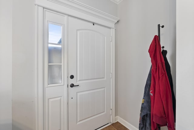 entryway featuring baseboards