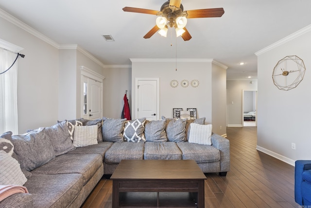 living area featuring visible vents, crown molding, dark wood-type flooring, and baseboards