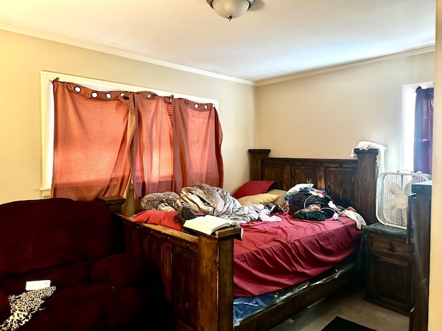 bedroom with ornamental molding