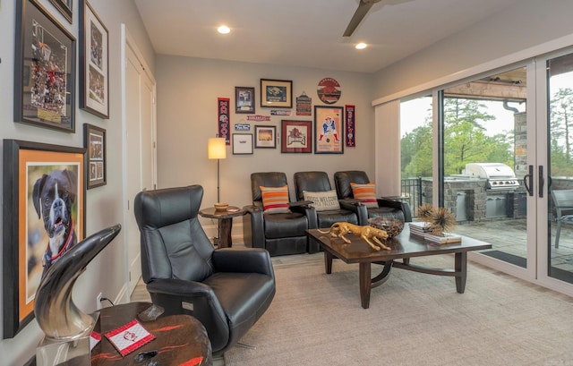 living room with recessed lighting and a ceiling fan