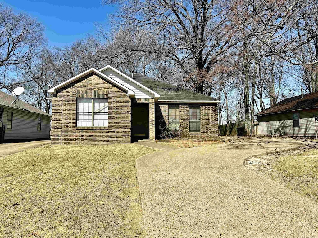 view of front of home with brick siding