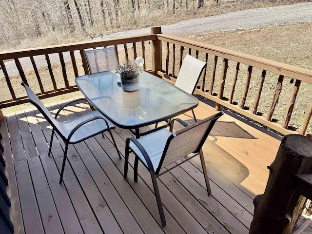 wooden deck with outdoor dining space