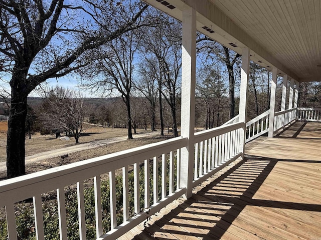 wooden terrace with covered porch