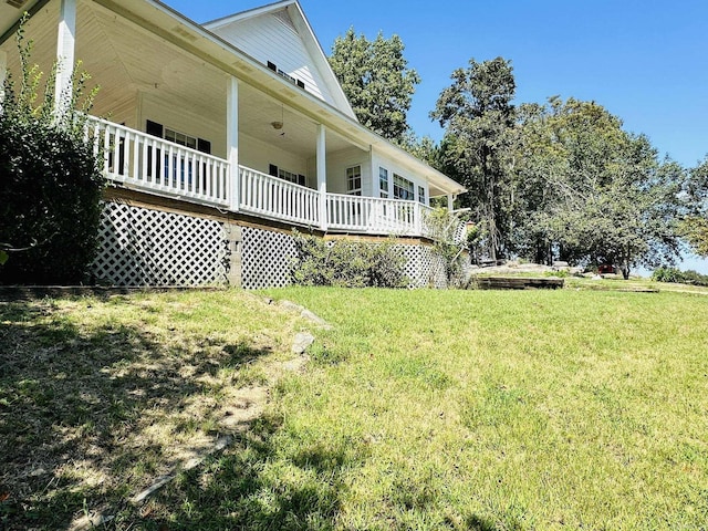 view of property exterior with a lawn