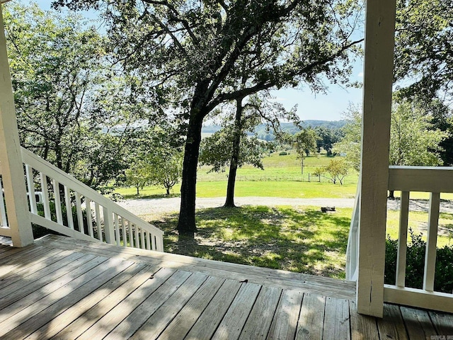 deck featuring a yard