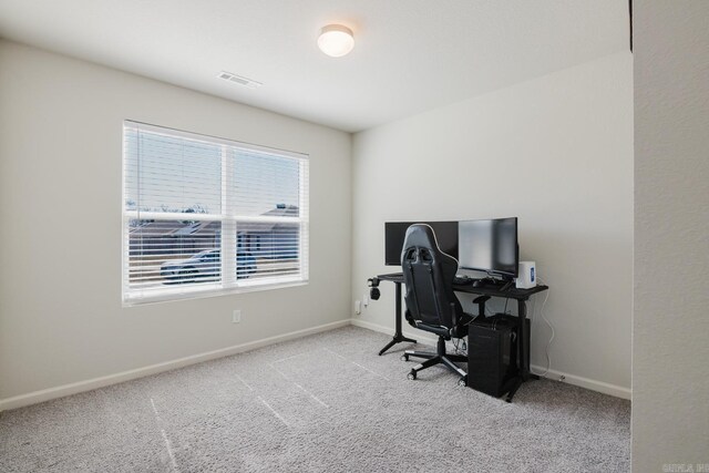 home office featuring visible vents, baseboards, and carpet floors