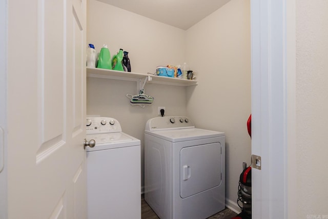 clothes washing area with laundry area and separate washer and dryer