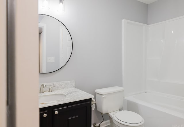 full bath featuring vanity, toilet, and tub / shower combination