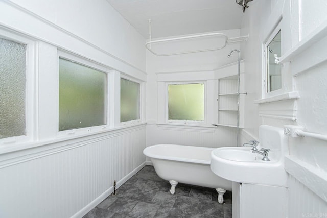 bathroom with a freestanding bath