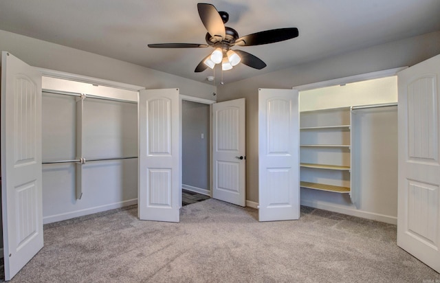 unfurnished bedroom featuring carpet flooring, a ceiling fan, and baseboards