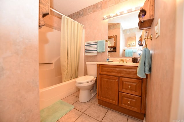 full bath with tile patterned floors, shower / bath combo with shower curtain, toilet, and vanity