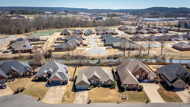 aerial view with a residential view and a water view