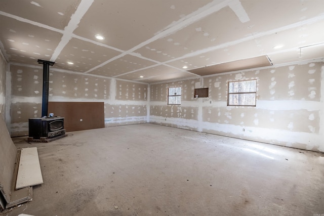 basement featuring a wood stove